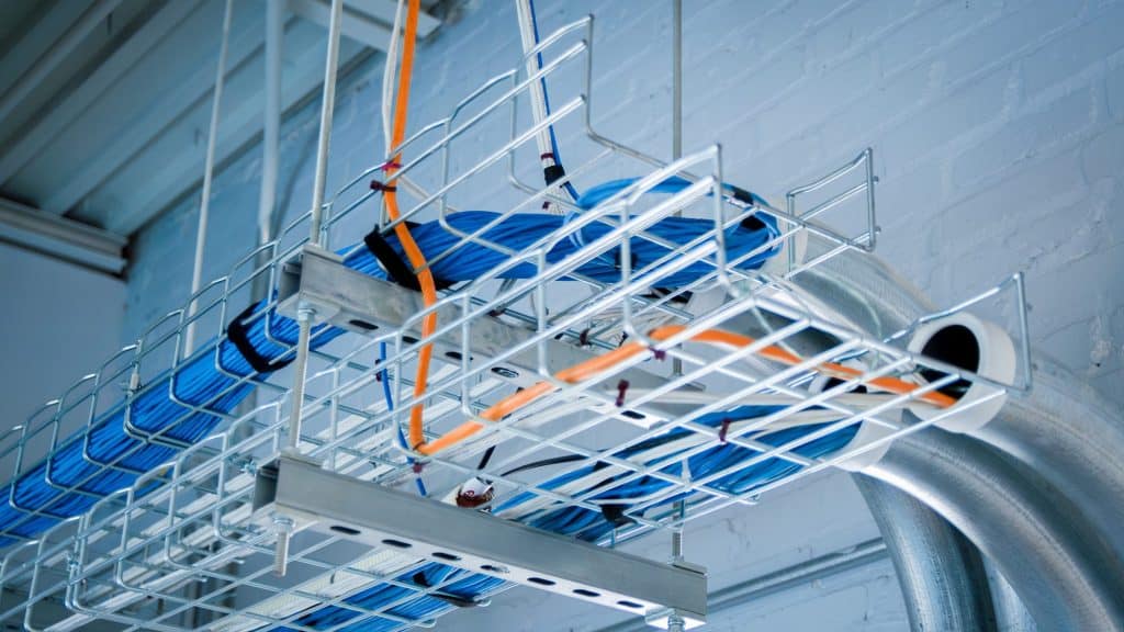 Wires in rack running through office
