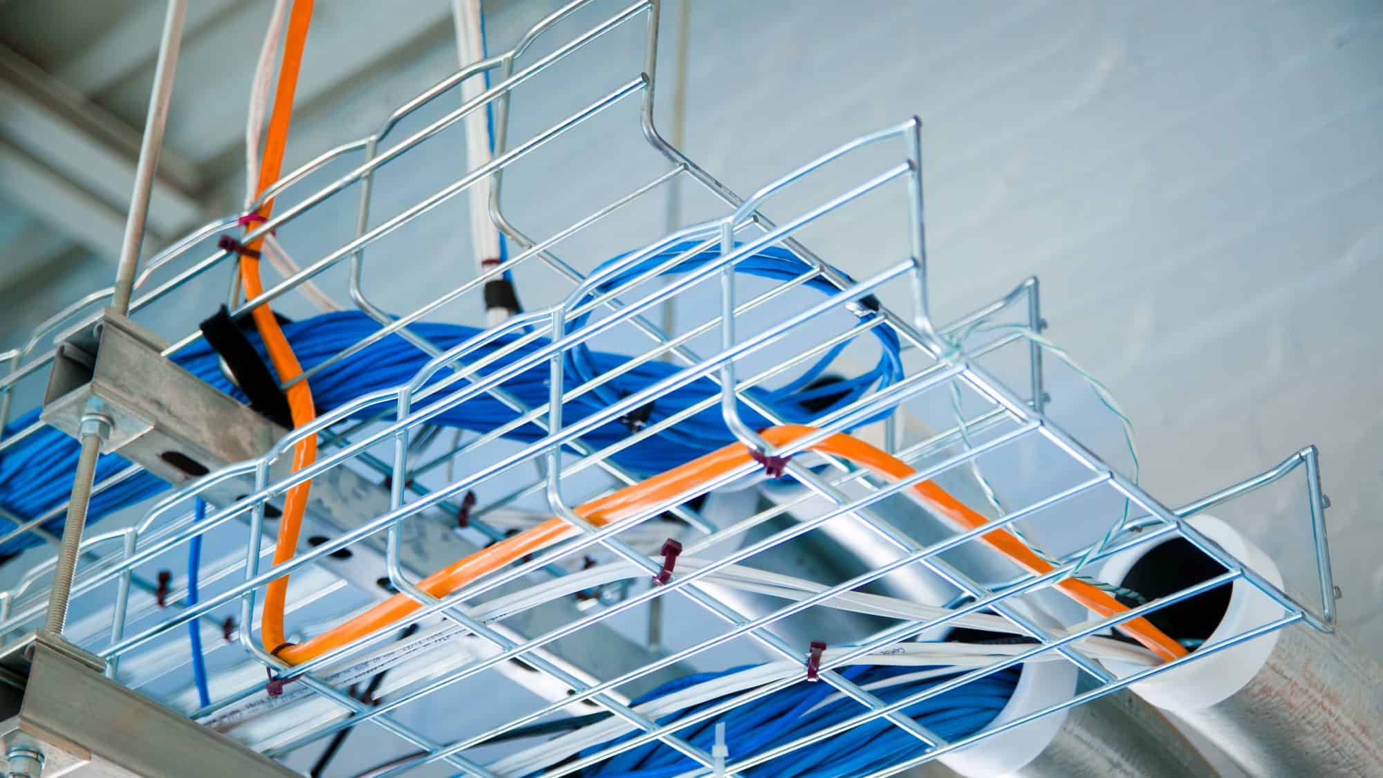 Wires in rack running through office