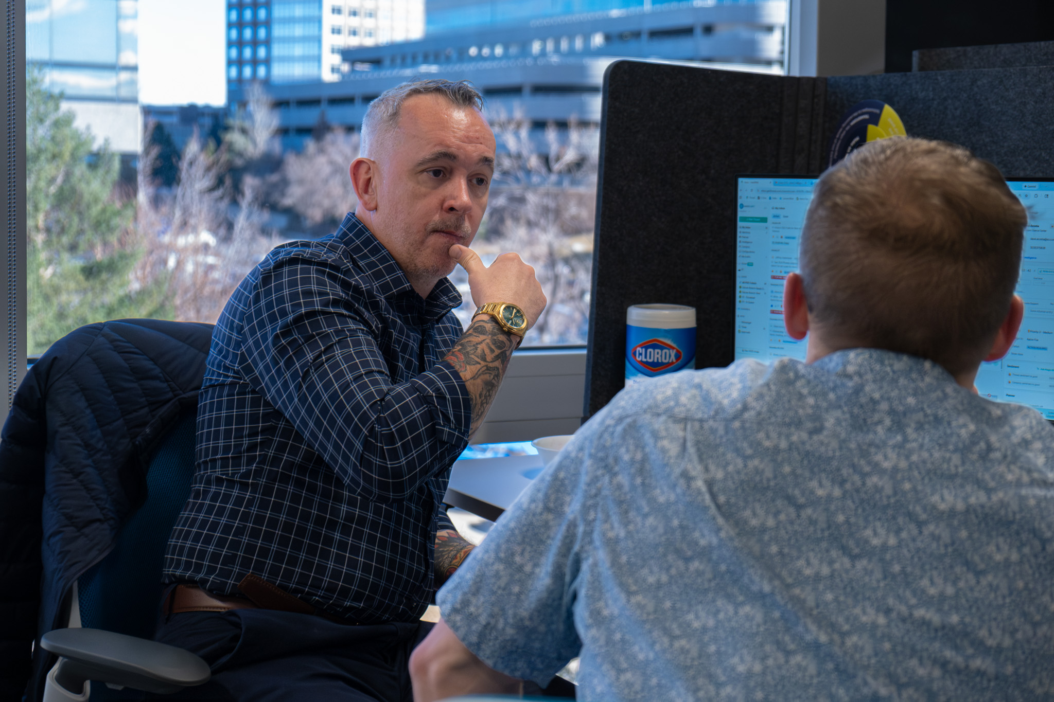A man talking with a technician.