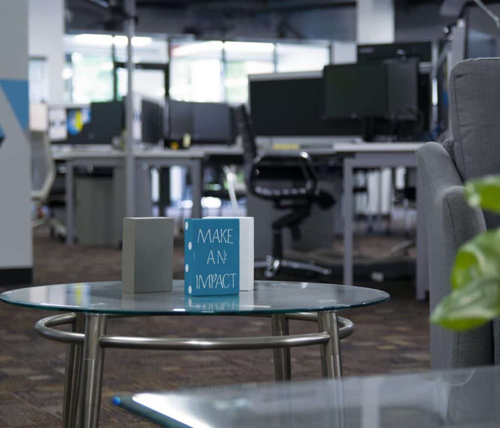 Block with 'Make an Impact' on it displayed in Indianapolis office